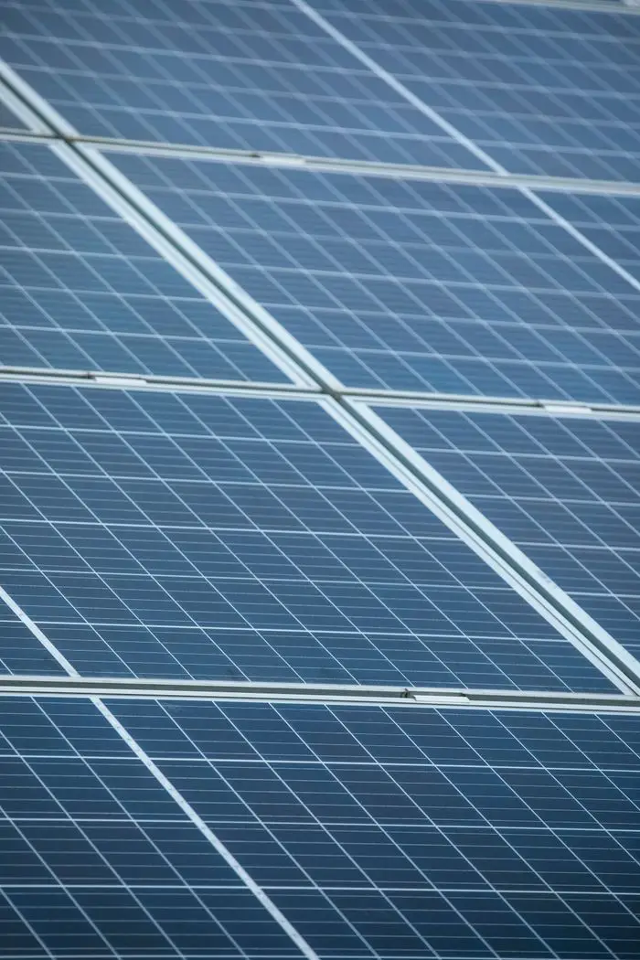 Crafting Captivating Headlines: Your awesome post title goes here Detailed view of solar panels capturing sunlight, promoting renewable energy.